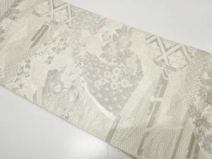 地紙に孔雀・草花模様織り出し　袋帯